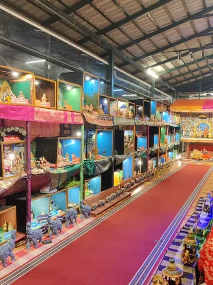 A view of our annual Dhaatu Navarātra Mahotsava. The entire hall is transformed into a landscape of stories, with thousands of dolls arranged in intricate dioramas that depict scenes from our epics and the vibrant life of Bharat.