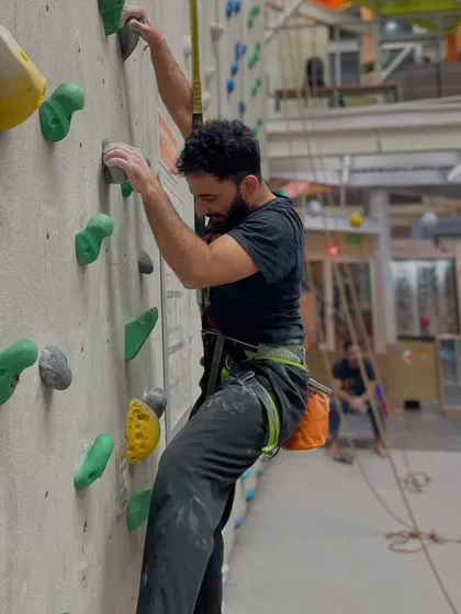 A climber works on his technique on one of our bouldering-style routes. The variety of holds keeps every session interesting.