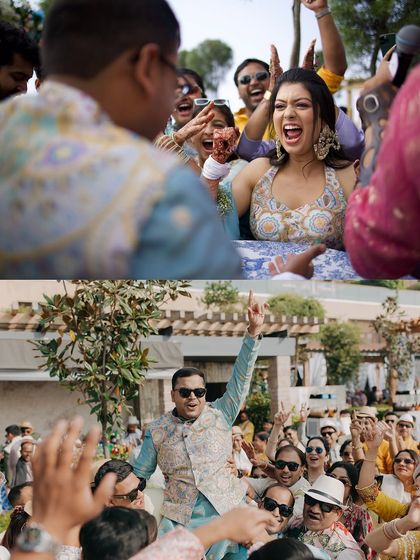 The groom Aabhaas being lifted up by his friends during the Haldi celebrations. This shot is all about high energy, fun, and the wild joy of celebrating with your best friends.