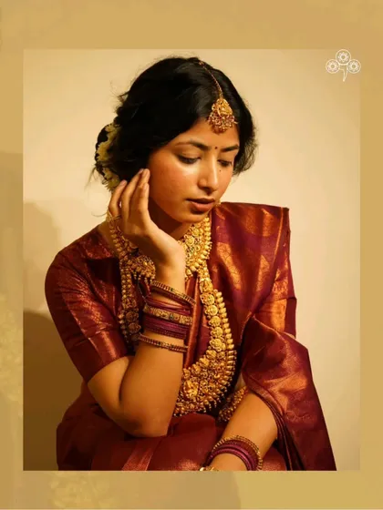 This look shows how beautifully the jewellery complements a traditional bridal hairstyle.