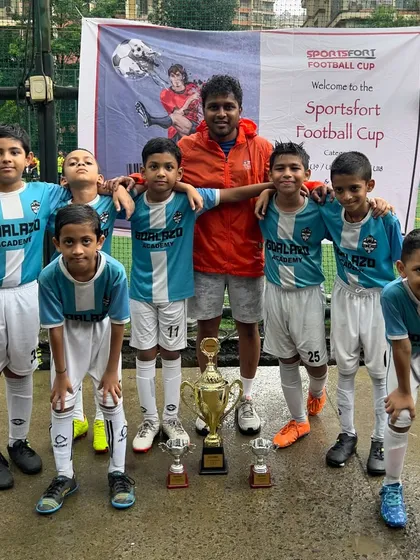 CHAMPIONS! The U-9 boys celebrate their big win at the Sportsfort Football Tournament in Thane, along with individual awards for Best Player and Best Goalkeeper.