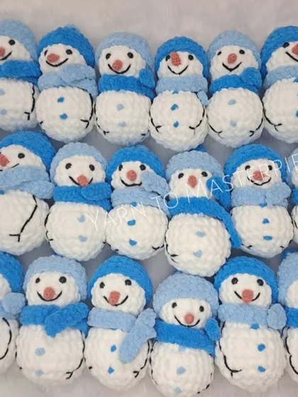An army of adorable snowman plushies, all ready for winter! These were part of a large Christmas order for return gifts.