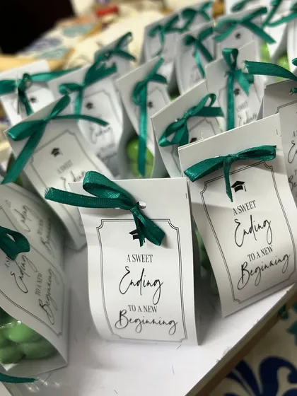 We even do favors for graduations. These bubble candles with 'A Sweet Ending to a New Beginning' tags are a meaningful and budget-friendly gift.