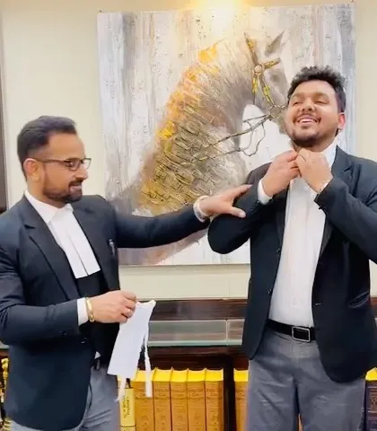 A proud moment, helping a former intern put on his advocate bands for the first time. This transition from student to professional is a journey I am privileged to witness and support.