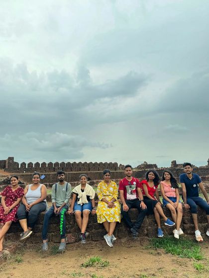 Another group sitting on the ancient walls of Mirjan Fort.