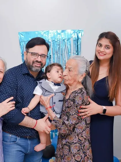 There is nothing more precious than the bond between generations. We quietly capture these tender moments, like a great-grandmother's kiss, creating timeless family portraits that tell a story of love through the years.