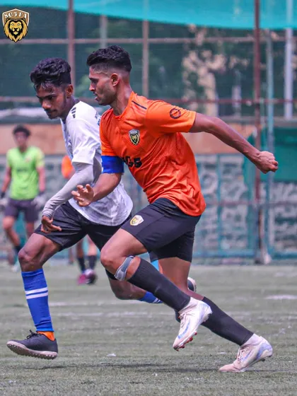 An SG5 player sprinting down the wing, showcasing the pace and fitness we build in our athletes.