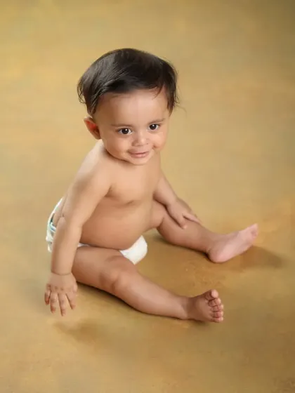 Look at that sweet expression. I love capturing these quiet, curious moments during a baby photoshoot.