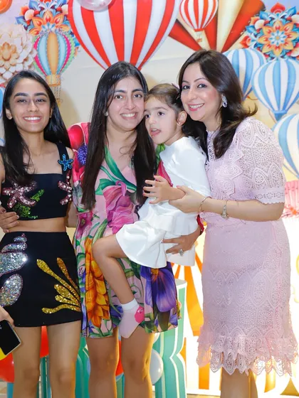 A beautiful group of guests enjoying a carnival-themed birthday party.