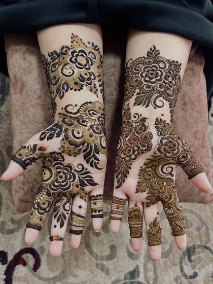 A beautiful floral design with a mix of bold, filled-in leaves and delicate flower outlines.