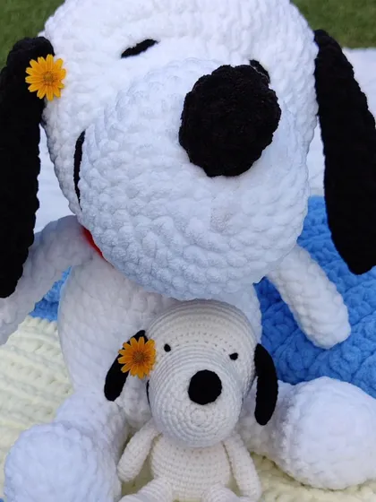 Big Snoopy, meet little Snoopy. I made the jumbo plushie with extra-squishy Blankie yarn for maximum huggability, and his mini-me is perfect as a desk buddy. Seeing them together shows the different sizes I can create for any custom character you have in mind.