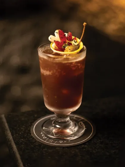 The 'Angel's Share' is an aperitivo-style cocktail with a slight fizz and a tangy balsamic flavor. It's a complex blend of gin, our own balsamic vermouth, Campari, and bitters.
