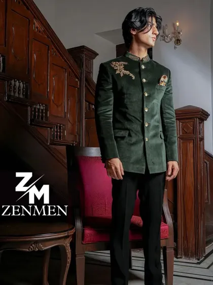 A full-length shot of the emerald velvet bandhgala, showcasing its regal color and classic silhouette.