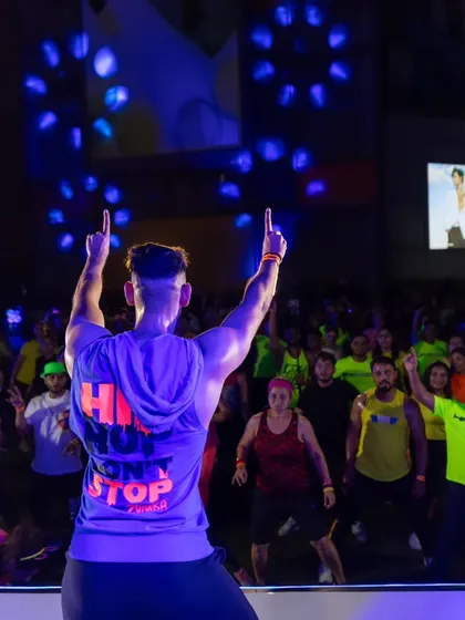 On stage, under the lights, leading hundreds of you. This is what pure joy looks like. You are not here to shrink, you are here to shine, and I am here to cheer you on.