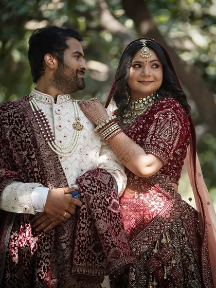 Another gorgeous couple's shot, this time with a focus on the bride's profile. You can see the clean lines of the eye makeup and the way her skin glows naturally in the daylight.