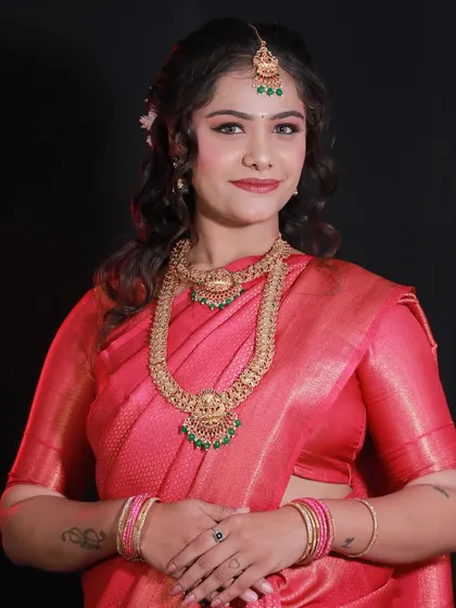 Another angle of the South Indian bridal look created by a student, highlighting the flawless base and eye makeup.