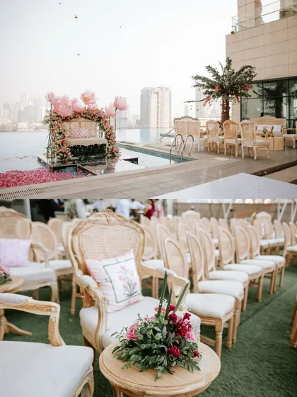 An overview of the guest seating arrangement alongside the pool, leading up to the magnificent floating stage.