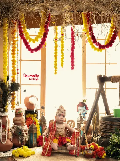 A wider view of the baby Krishna photoshoot, showing the full scale of our rustic and festive Janmashtami decorations.