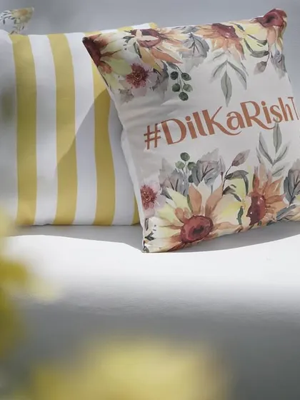 Personalization is key. For a wedding in Antalya, we incorporated the couple's hashtag, #DilKaRishta, into the decor, including these custom-printed cushions for a personal and memorable touch.