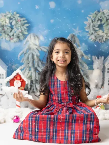 Playing in the "snow" during a Christmas mini session. I create a fun and interactive environment to bring out the most joyful expressions.