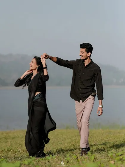 A graceful dance by the lakeside. The movement and connection between the couple make for a dynamic and beautiful photograph.