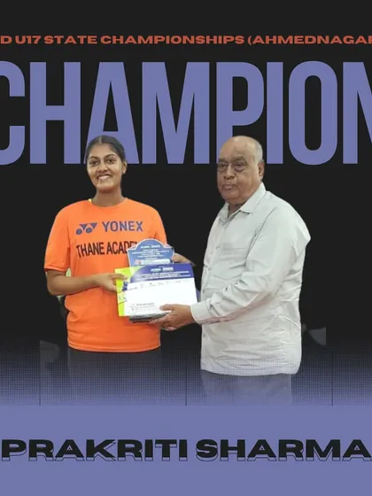 Prakriti Sharma celebrating her Girls Doubles U17 championship at the state championships in Ahmednagar.