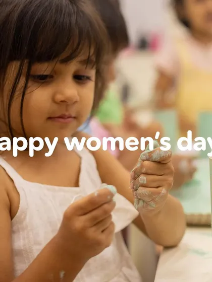 A girl concentrates on her craft, a quiet moment of creativity and focus. Happy Women's Day.