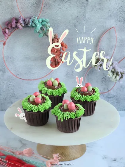 My Easter cupcakes are topped with chocolate frosting "grass" and mini candy eggs. They are a festive and delicious treat for celebrating the arrival of spring.