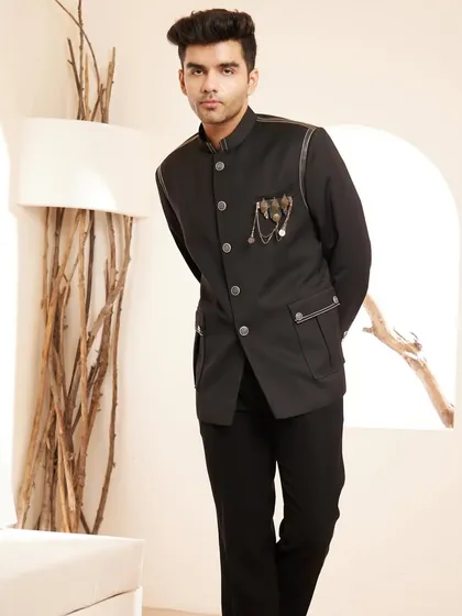 Our black bandhgala jacket combines timeless sophistication with a bold, modern twist. Perfectly tailored for a sharp, distinctive look, this statement piece is designed for the man who is always ahead of the curve.