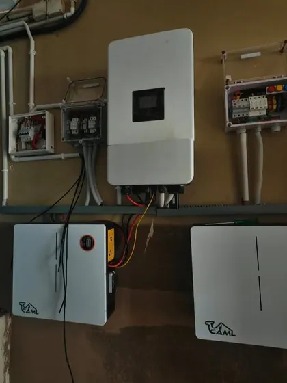 The indoor components of the 10 kW hybrid system at the university, including two CAML wall-mount batteries and a smart inverter. This setup ensures seamless power backup for critical academic facilities.