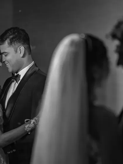 Creating a vintage Hollywood vibe with this black and white wedding portrait. The reflection in the background adds a creative, cinematic touch.