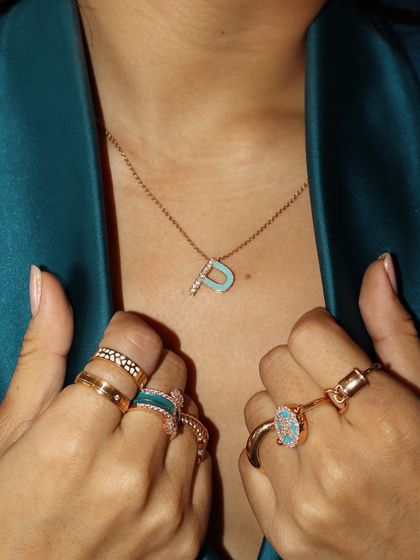 Customize it, wear it, love it. Another view of our personalized initial pendant, a perfect way to make your jewellery truly your own.