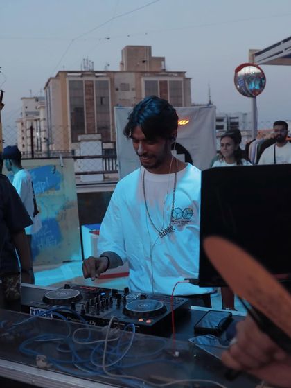 In the zone at the Ahmedabad rooftop party. The sun was setting, and the vibes were just right for a great set.