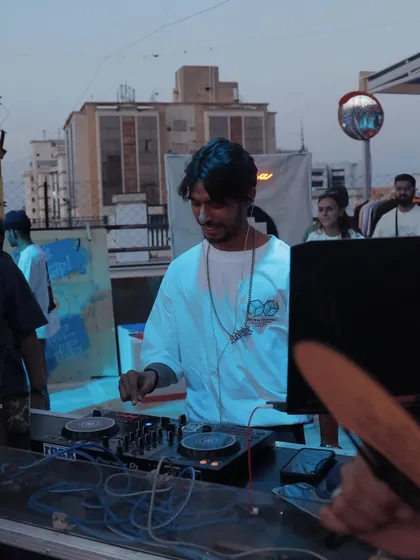 In the zone at the Ahmedabad rooftop party. The sun was setting, and the vibes were just right for a great set.
