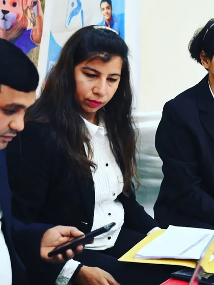 Our team of judges and officials, focused and ready during a competition. Many of our senior students also learn to judge.