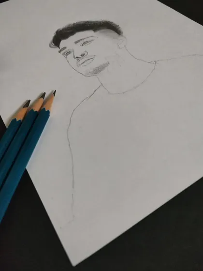 The first step is always a clean outline. This is a work-in-progress shot of a portrait before the detailed shading begins.