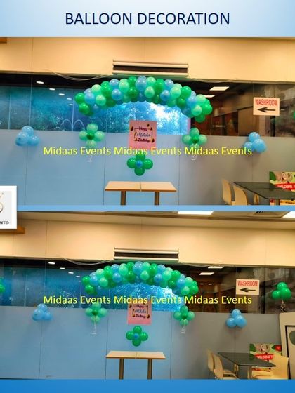 Another view of the green and blue balloon arch, showing how it can brighten up a simple space.