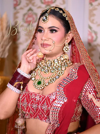 A full view of a traditional red bridal look created by one of my talented students.