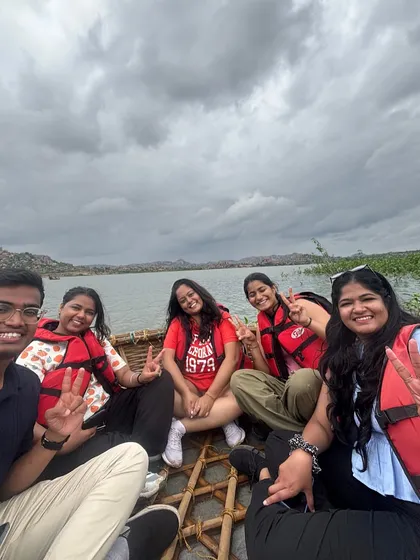 Enjoying a traditional coracle ride on the Tungabhadra river in Hampi. This is a must-do activity that offers a unique perspective of the ruins.