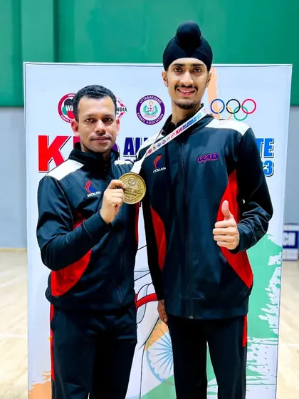 With my coach after winning silver with the Delhi Team at the Senior Team Kumite Nationals. We will work harder to turn this silver into gold next time.