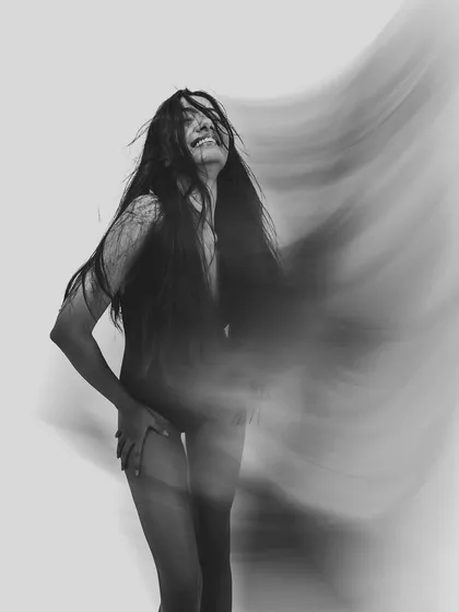 Capturing raw energy and movement with a slow shutter speed. This black and white artistic shot is an example of how I use technical skills to create timeless, soulful images that feel alive.