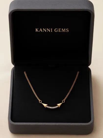 Sometimes, the simplest pieces make the most personal statements. This delicate gold necklace, with its curved bar of pavé diamonds, is designed to add just the right sparkle to your neckline, turning everyday moments into quiet celebrations of style.