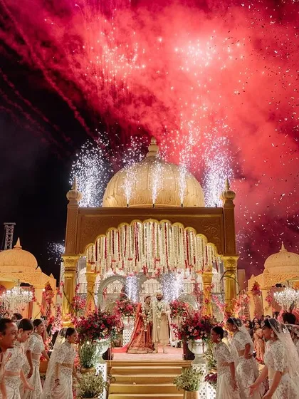 A moment of pure celebration as fireworks illuminate the sky above our custom-built 'Shahi Jharokha' stage. My goal is to frame these timeless memories with architectural grandeur and explosive joy, creating a truly unforgettable spectacle.