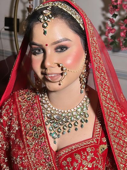 My beautiful bride Himanshi, looking like a dream. Her makeup features dramatic smokey eyes that make a bold statement.