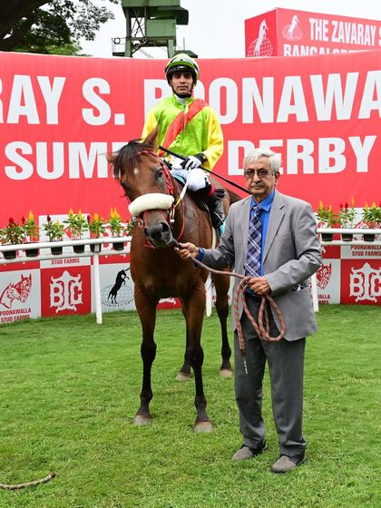 Fortunate Son, winner of The Veterinarian's Trophy, with jockey Prashant P. Dhebe.