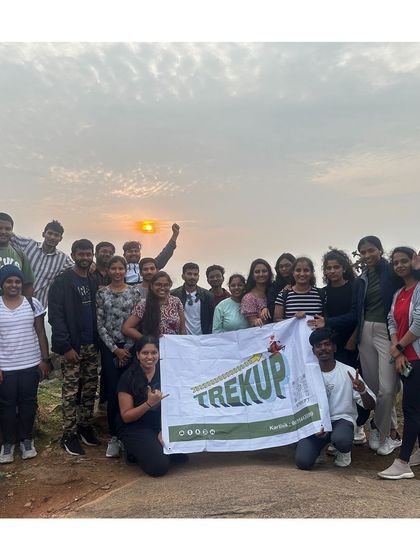 A beautiful sunrise group photo from the Huthridurga trek.