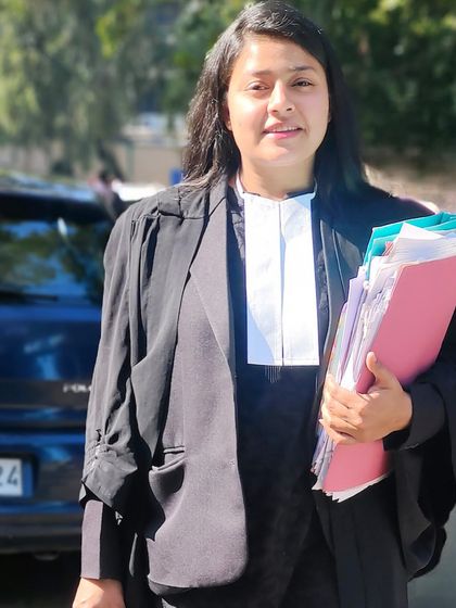 Holding a case file at the Delhi High Court. The greatest peace comes from knowing that through your efforts, justice has been served.