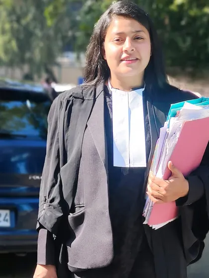 Holding a case file at the Delhi High Court. The greatest peace comes from knowing that through your efforts, justice has been served.