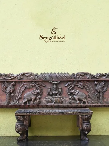 A grand 79-inch panel featuring Rajarajeshwara GajaLakshmi with Shri Ganesha and Goddess Saraswathi. This comprehensive carving brings together the deities of power, prosperity, wisdom, and knowledge in one magnificent piece.