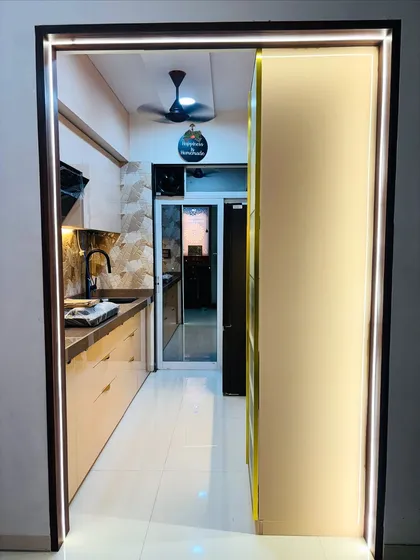 A view from the kitchen doorway, framed by LED strip lighting. This shows how I use lighting to create a grand entrance to the heart of the home.